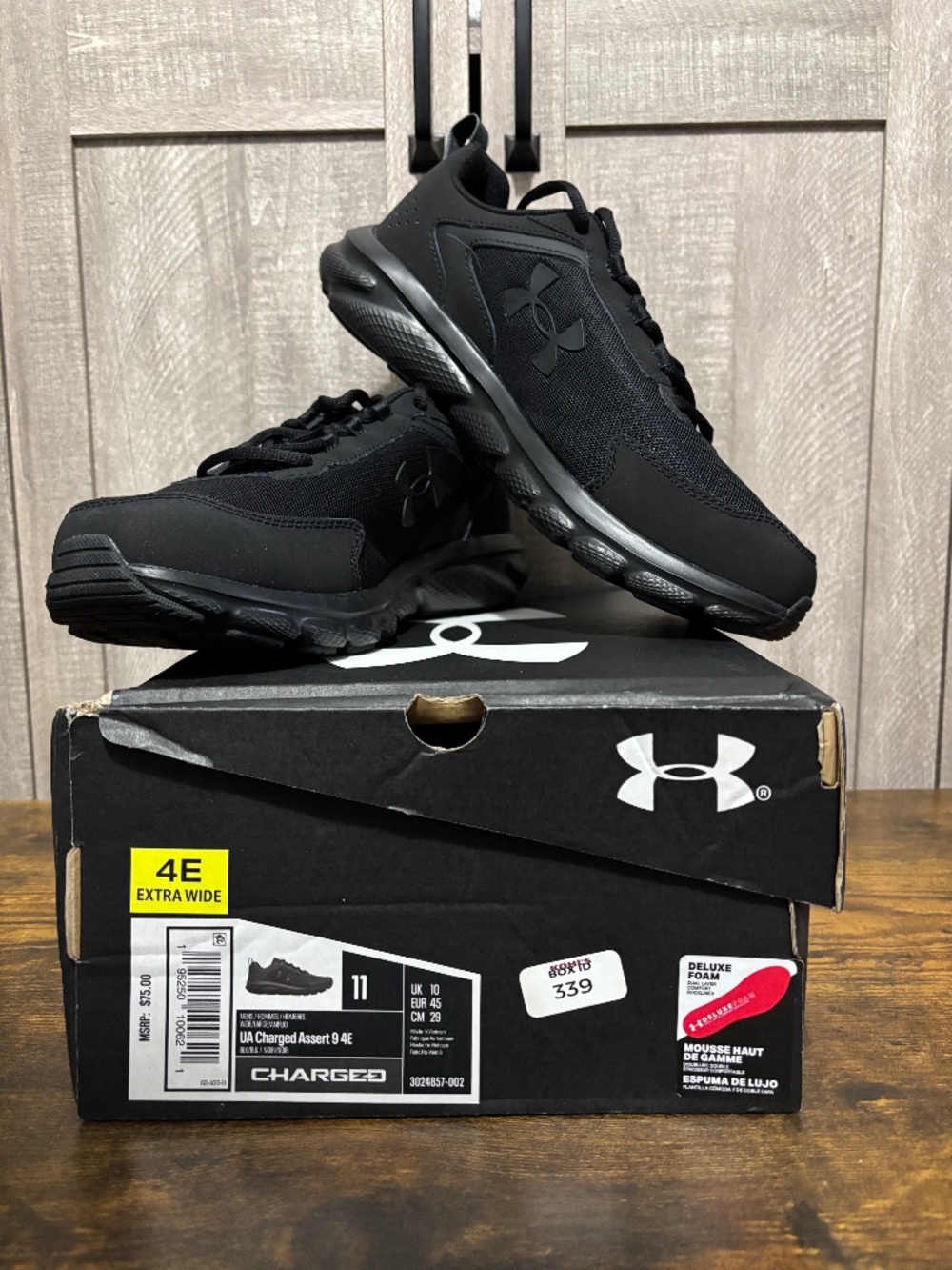 Men's Black Under Armour 11 extra wide Charged Assert 9